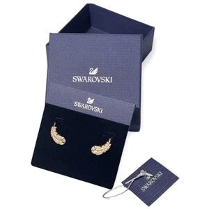 Like new Swarovski feather stud earring in box